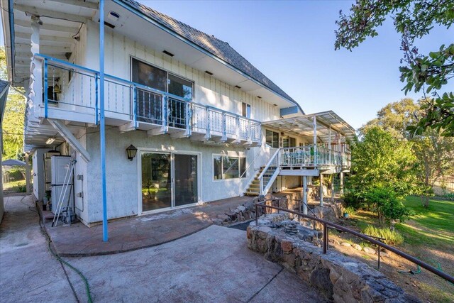 rear view of property with a patio area