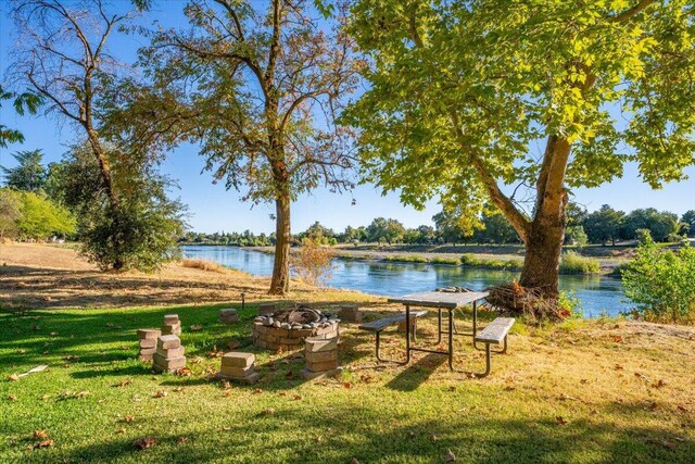 water view featuring a fire pit