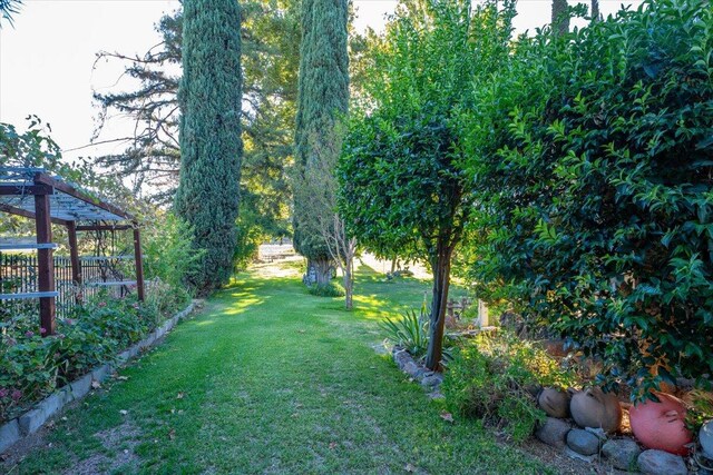 view of yard with a pergola