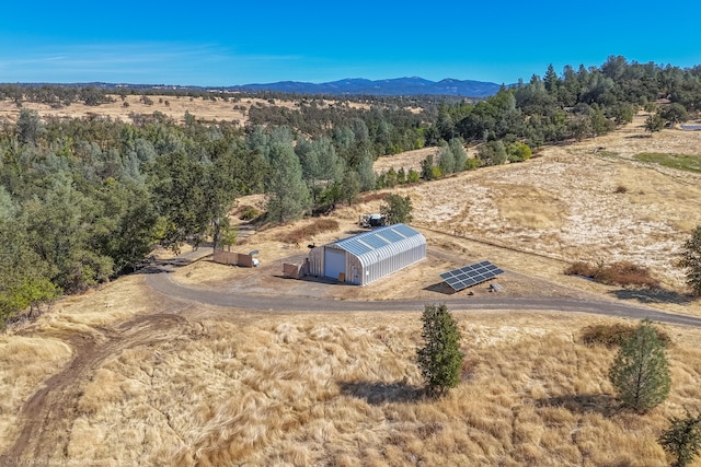 bird's eye view with a mountain view