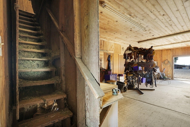 stairway featuring wood ceiling