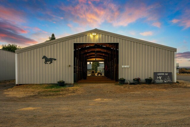 view of outdoor structure at dusk