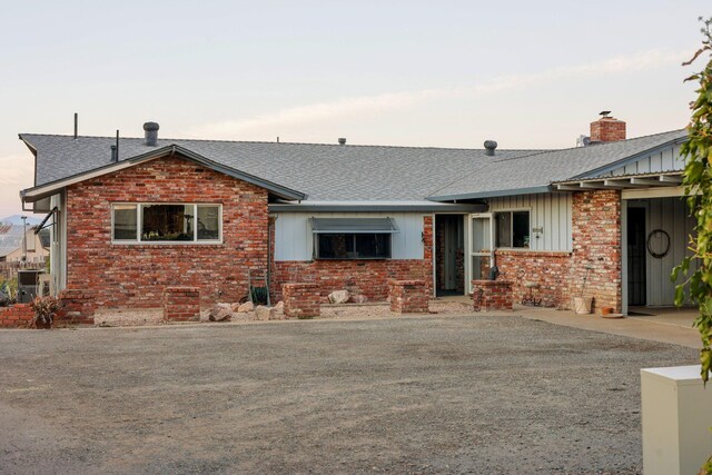 ranch-style home with a patio