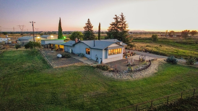 exterior space with a lawn and a patio area