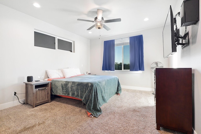 carpeted bedroom featuring ceiling fan