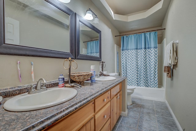 full bathroom featuring vanity, toilet, and shower / bathtub combination with curtain