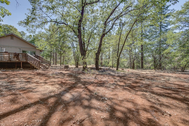 view of yard with a wooden deck