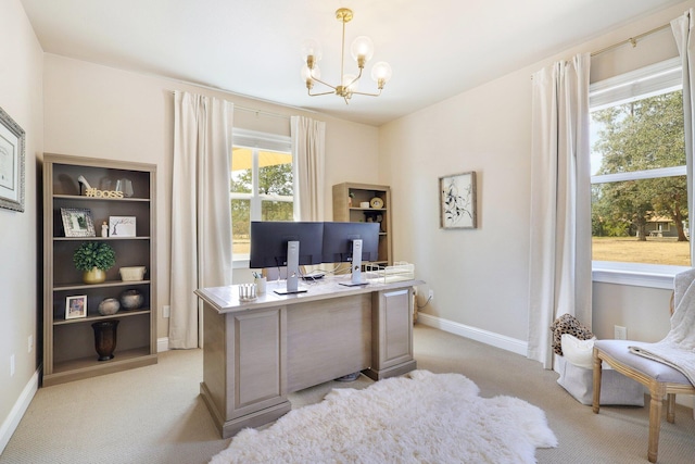 office space with a chandelier and light colored carpet