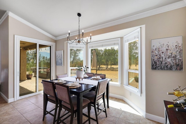 tiled dining space featuring crown molding, vaulted ceiling, and an inviting chandelier