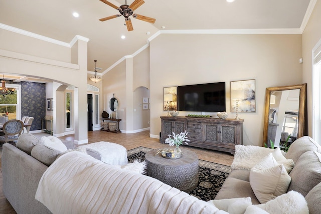 living room featuring crown molding, high vaulted ceiling, light tile patterned floors, and ceiling fan