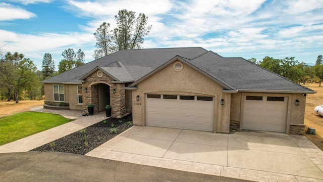 ranch-style home featuring a garage