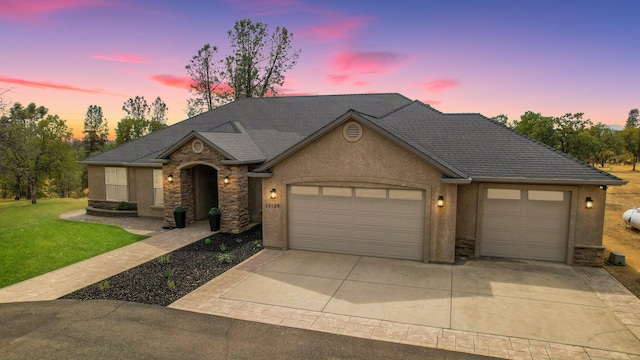 view of front of home with a garage