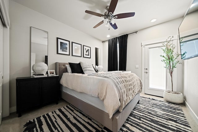 bedroom with ceiling fan and carpet floors