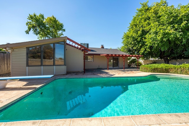 view of swimming pool with a fenced in pool, a pergola, a patio, and fence