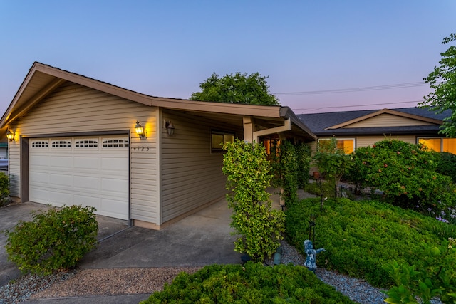 single story home featuring a garage