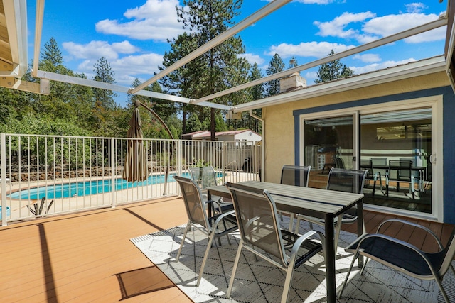 view of patio featuring a fenced in pool