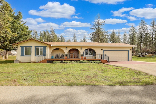 single story home featuring a garage, driveway, a porch, and a front yard