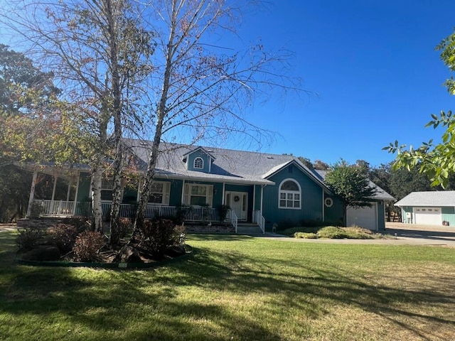 single story home with a garage, a front lawn, and a porch