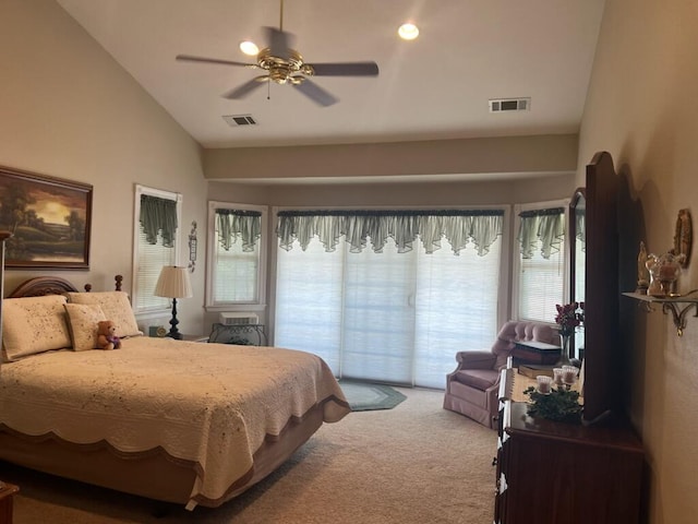 carpeted bedroom with vaulted ceiling and ceiling fan