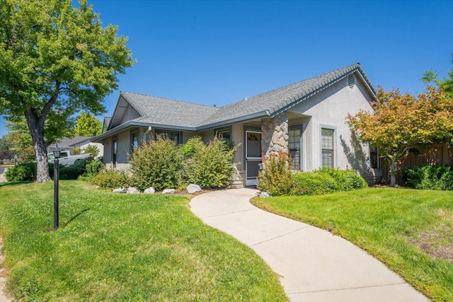 view of front of home featuring a front lawn