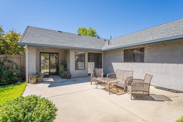 back of house with a patio area