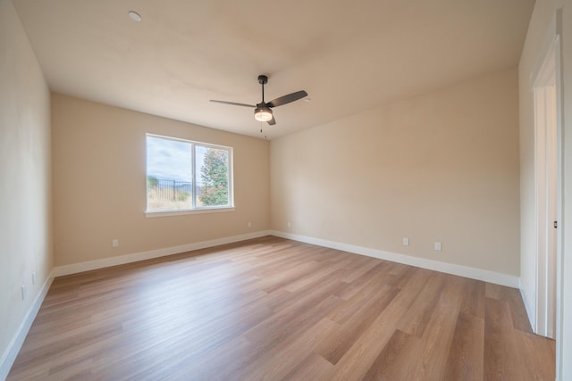 1132 Kellinger St, Redding, CA 96003 - empty room with a ceiling fan, baseboards, and light wood finished floors