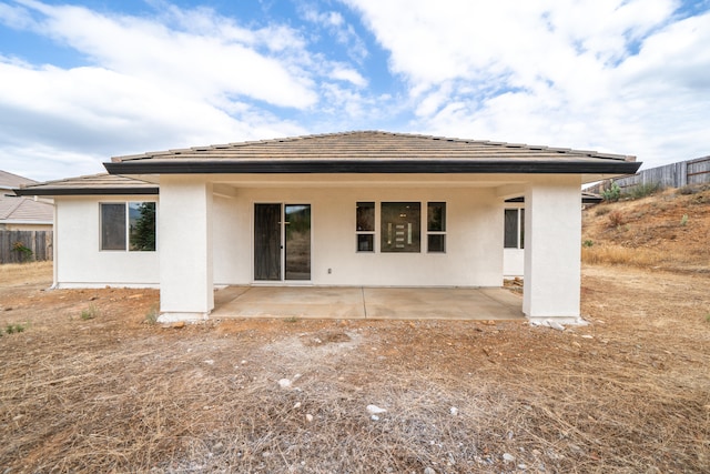 rear view of property with a patio