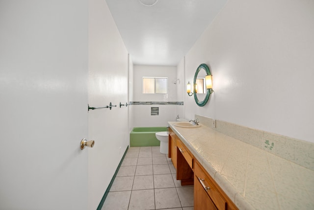 bathroom featuring vanity, tile patterned flooring, and toilet