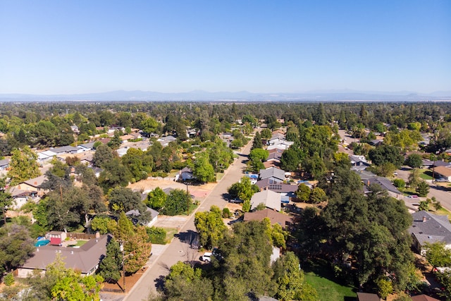 drone / aerial view featuring a mountain view