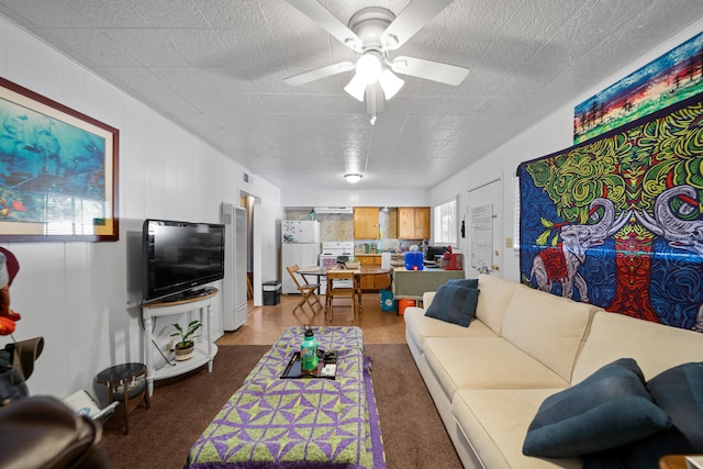 living room featuring ceiling fan