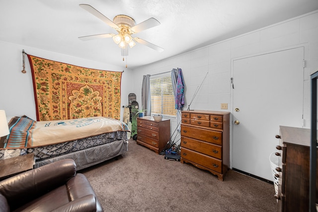 bedroom featuring ceiling fan and carpet flooring