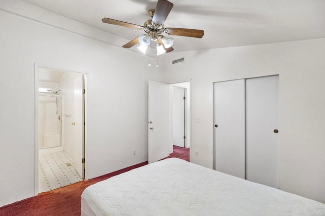 bedroom with ceiling fan, a closet, ensuite bath, and carpet