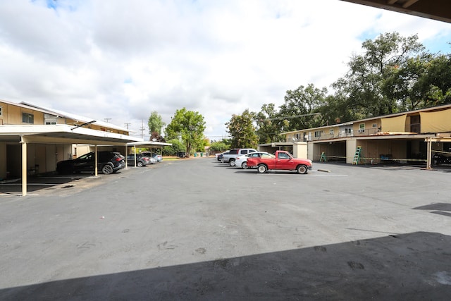 view of parking featuring a carport