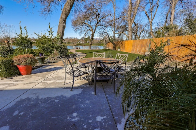 view of patio / terrace with a water view