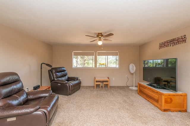 living room with light carpet and ceiling fan