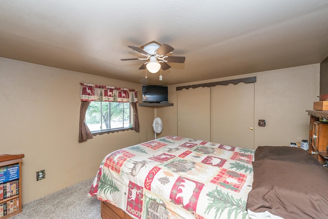 bedroom featuring carpet flooring and ceiling fan