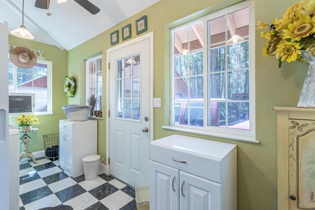 interior space featuring ceiling fan and lofted ceiling