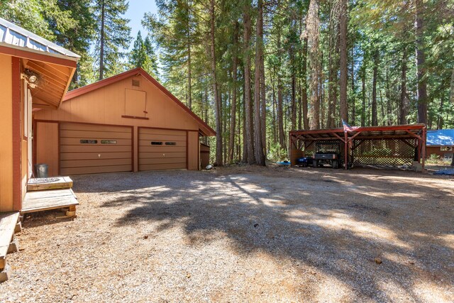 view of side of home featuring a carport