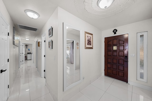 view of tiled foyer entrance