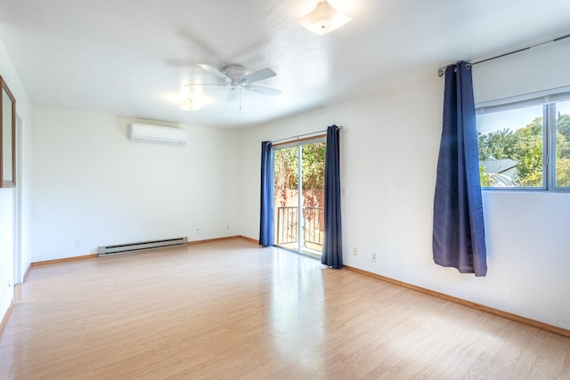 empty room with light hardwood / wood-style floors, a baseboard heating unit, a wall mounted AC, and ceiling fan