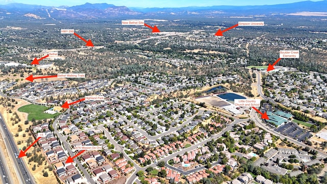 bird's eye view with a mountain view