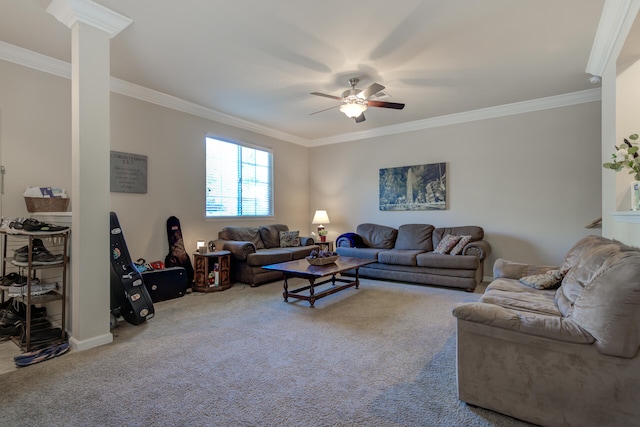 living room with ceiling fan, ornamental molding, decorative columns, and carpet flooring