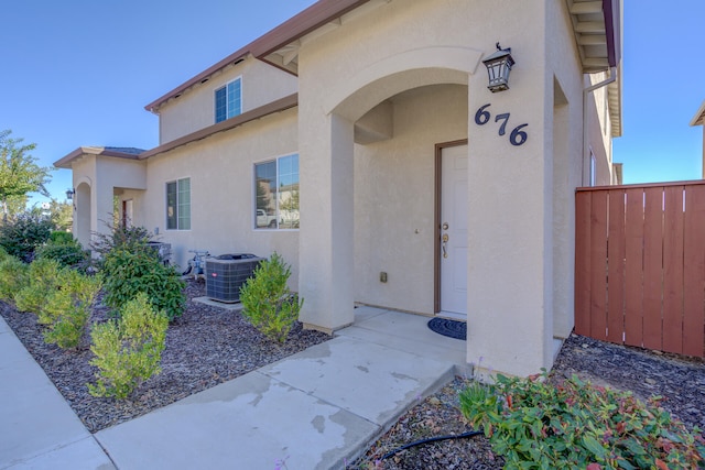 entrance to property with central AC unit