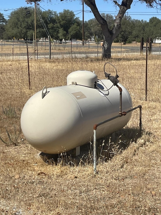 3471 Charles St, Cottonwood, CA 96022 - exterior details with heating fuel and fence