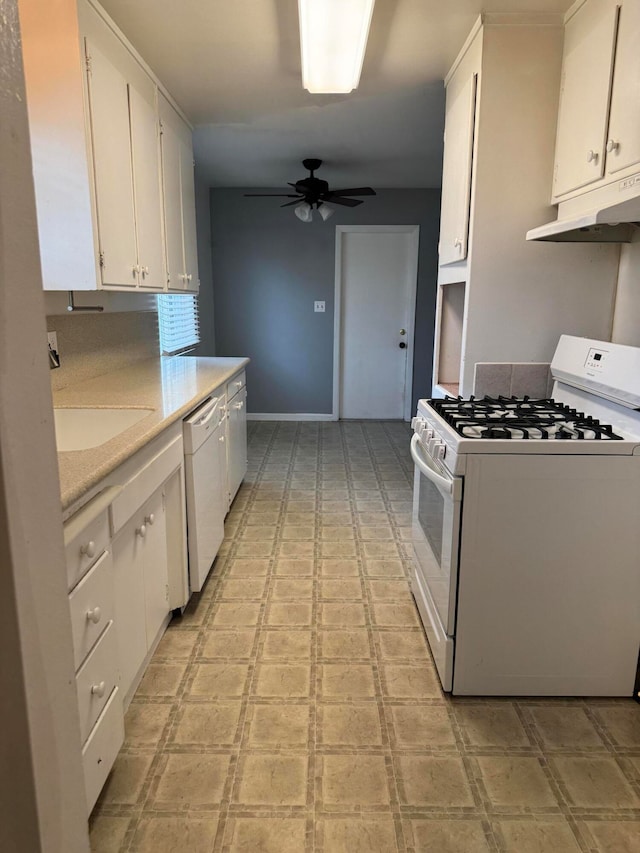 kitchen with white cabinets, white appliances, ceiling fan, and sink