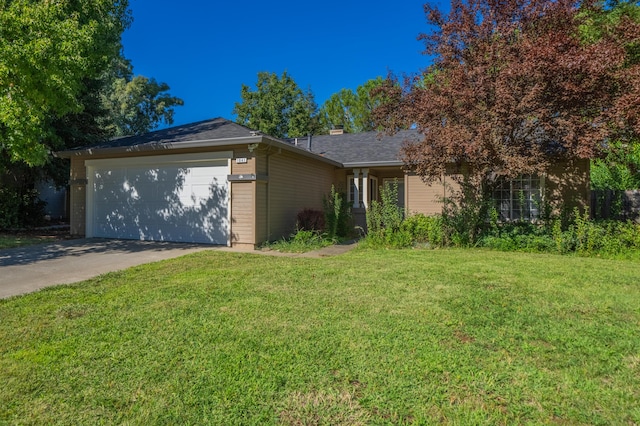 single story home with a garage and a front yard