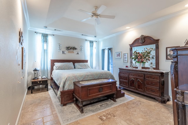 bedroom featuring a raised ceiling, ceiling fan, and crown molding