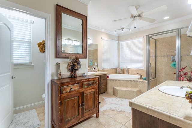 bathroom with vanity, tile patterned flooring, ceiling fan, ornamental molding, and tiled bath