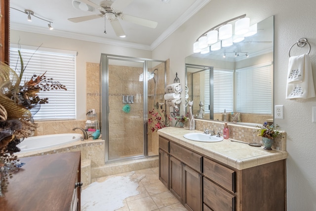 bathroom featuring vanity, ceiling fan, crown molding, plus walk in shower, and tile patterned flooring