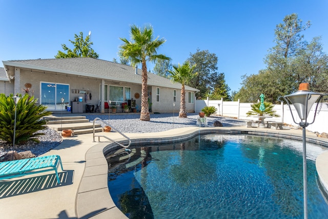 view of pool featuring a patio